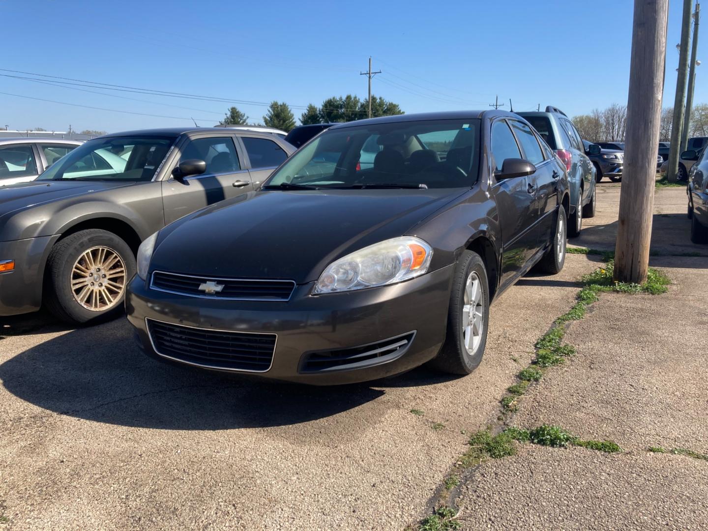 2008 Mocha Bronze Met Chevrolet Impala LT (2G1WT58KX81) with an 3.5L V6 OHV 12V FFV engine, 4-Speed Automatic Overdrive transmission, located at 1800 South Ihm Blvd, Freeport, IL, 61032, (815) 232-5543, 42.278645, -89.607994 - Impala LT 4D Sedan - Photo#0